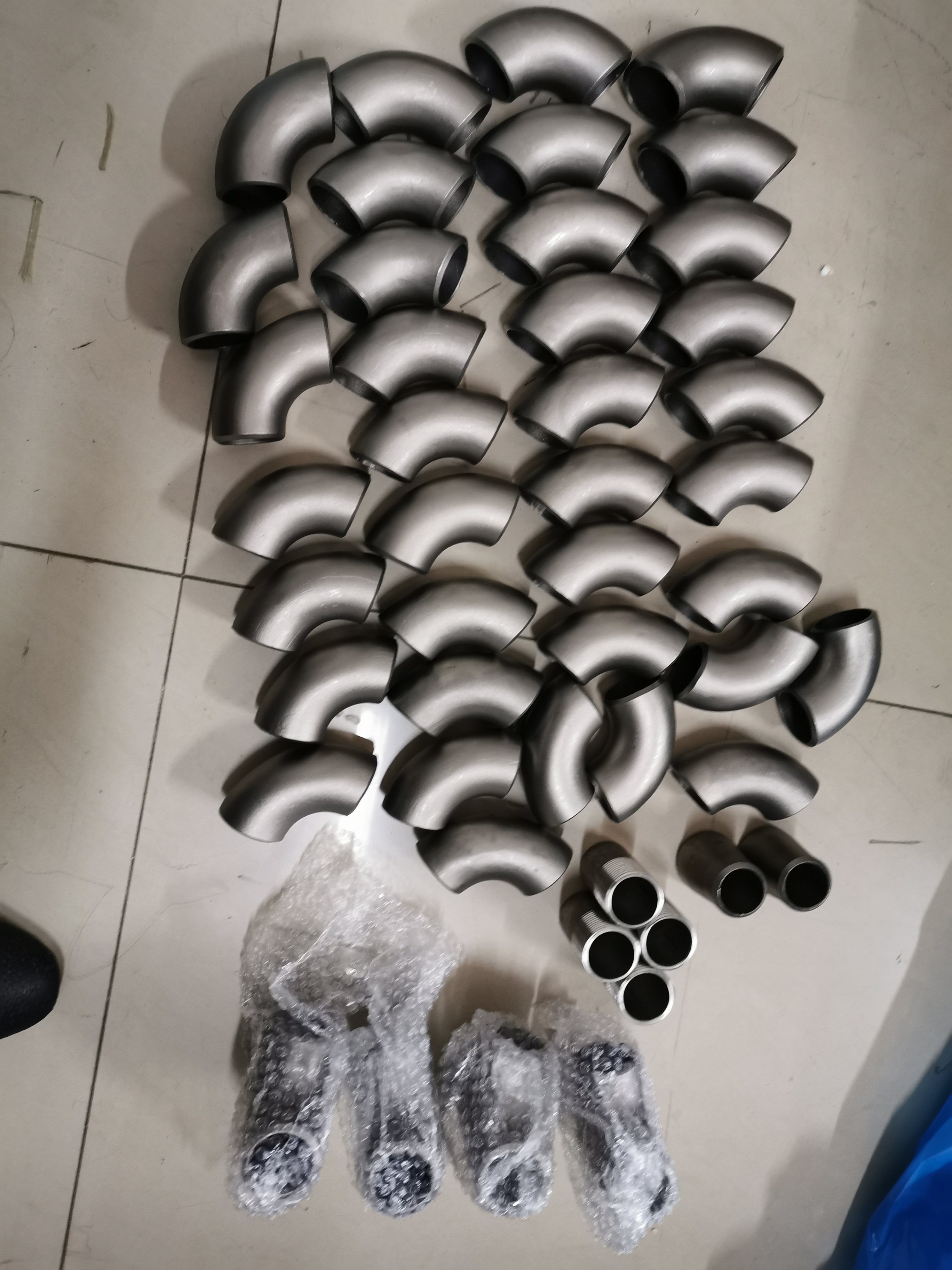 欣旺腾现货TA2钛弯头  化工用钛连接弯头  钛合金弯头 高强度弯头